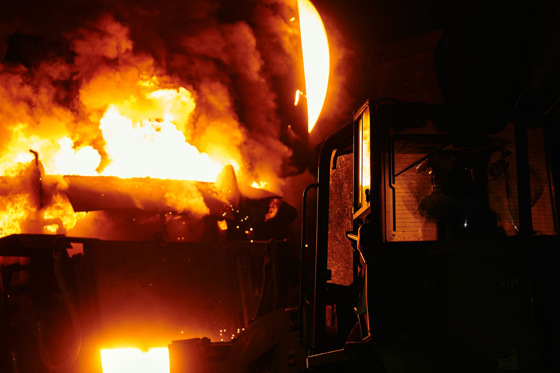 Molten metal being poured at a foundry